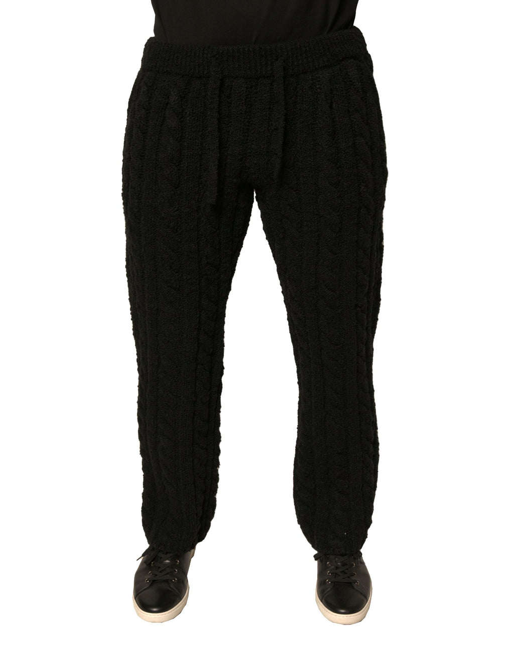 Pantalons skinny en laine noire de Dolce & Gabbana, coupe ajustée et tricotée, vue de face sur un fond neutre.