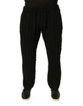 Pantalon skinny en laine noire Dolce & Gabbana, coupe ajustée, tissu tricoté, détail élégant visible sur l'image.