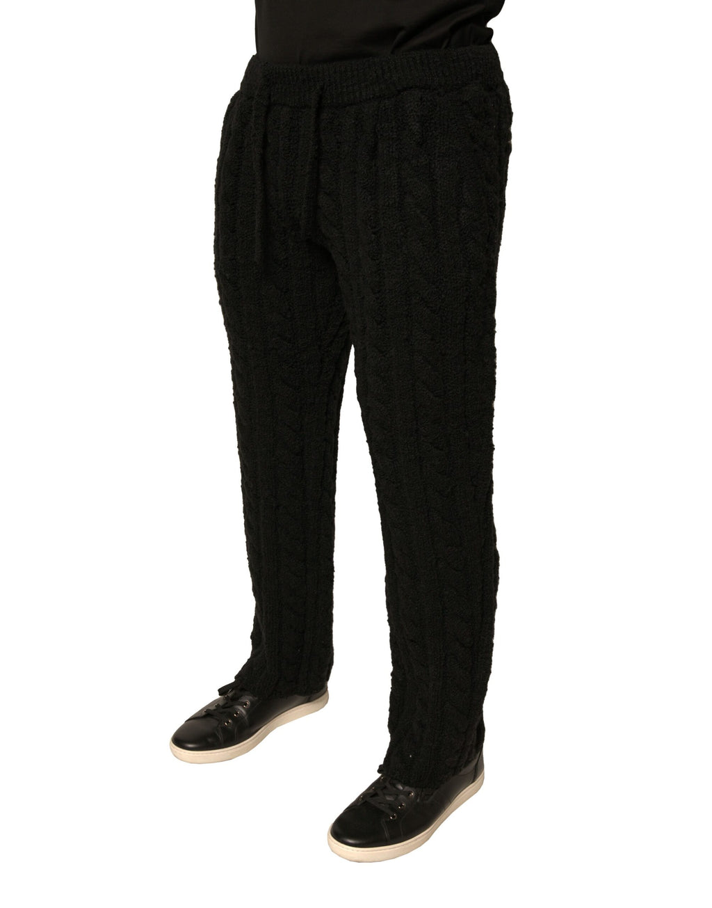 Pantalons skinny en laine noire Dolce & Gabbana, coupe ajustée et tricotée, vue de face.