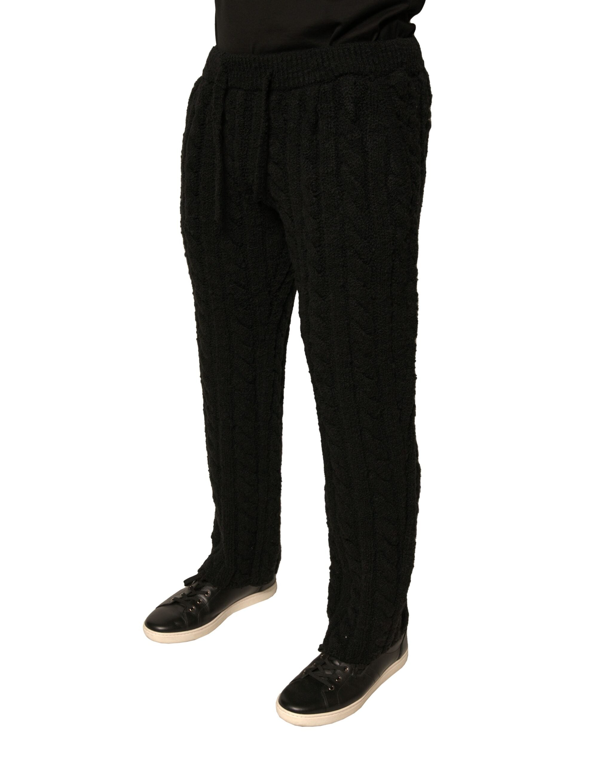 Pantalons skinny en laine noire Dolce & Gabbana, coupe ajustée et tricotée, vue de face.