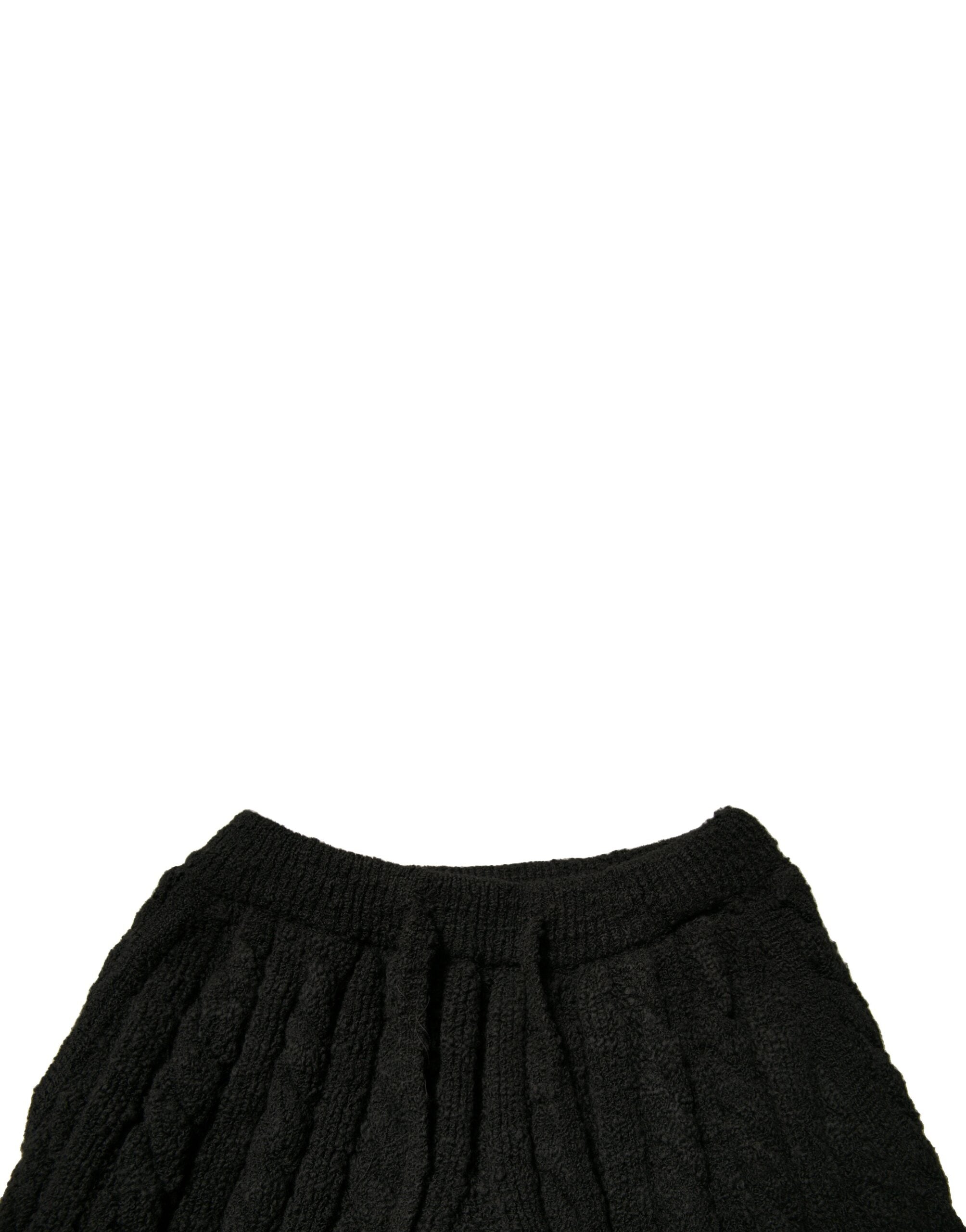 Pantalon skinny en laine noire de Dolce & Gabbana, coupe ajustée, texture tricotée, mode élégante pour femme.
