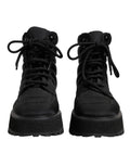 Bottes noires Dolce & Gabbana en rembourrage mi-mollet avec lacets, style élégant et moderne, vues de face.