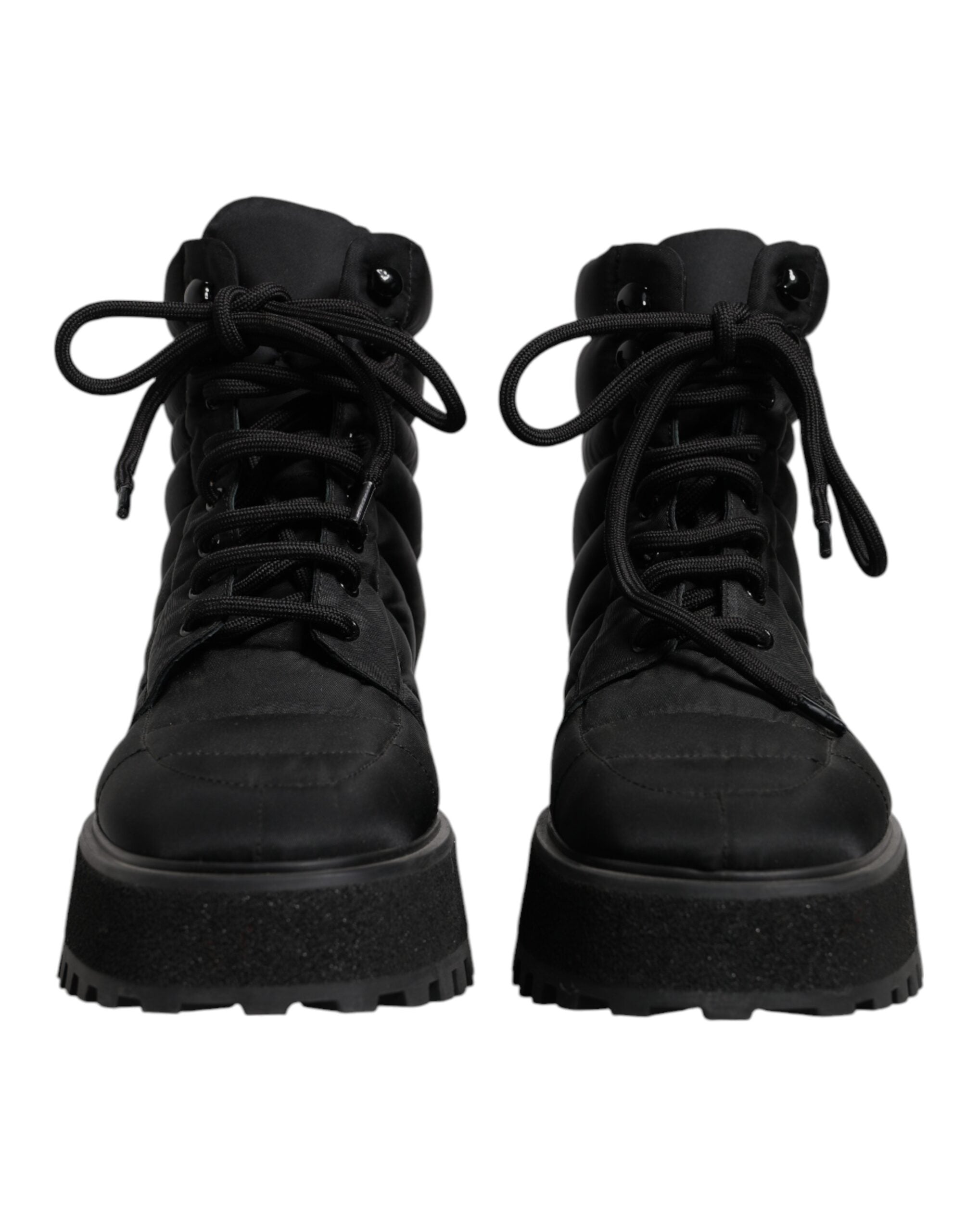 Bottes noires Dolce & Gabbana en rembourrage mi-mollet avec lacets, style élégant et moderne, vues de face.