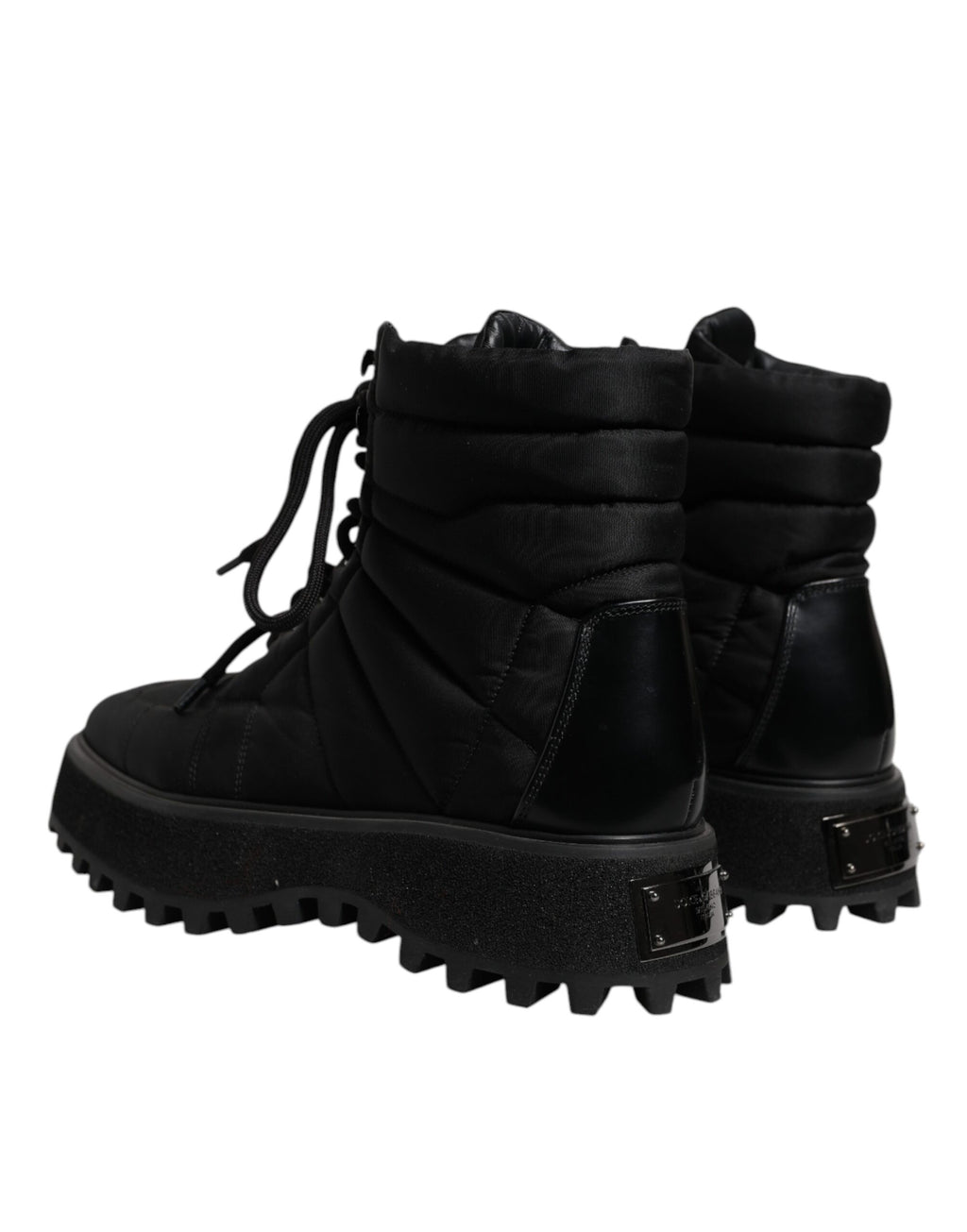 Bottes noires Dolce & Gabbana en rembourrage mi-mollet avec lacets, style élégant et moderne.