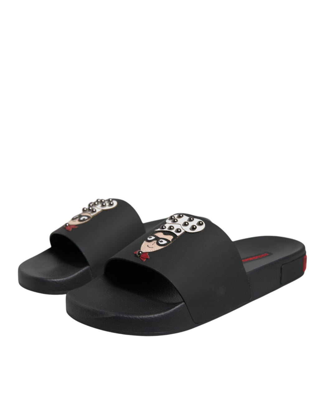 Sandales en cuir noir Dolce & Gabbana, chaussures de plage élégantes, avec semelle plate et design simple, vue de côté.