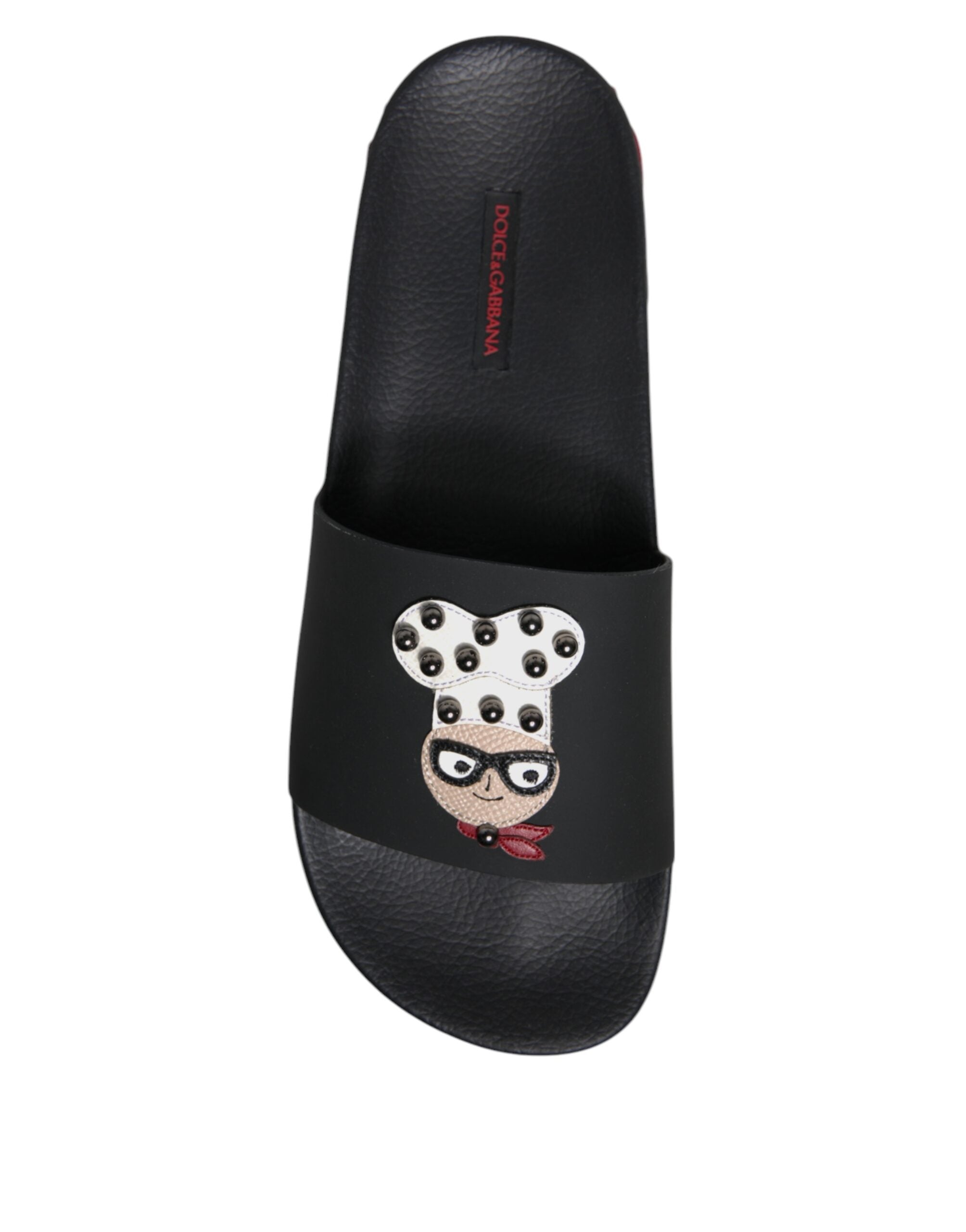 Sandales en cuir noir Dolce & Gabbana, chaussures de plage élégantes, avec semelle plate et design sobre.