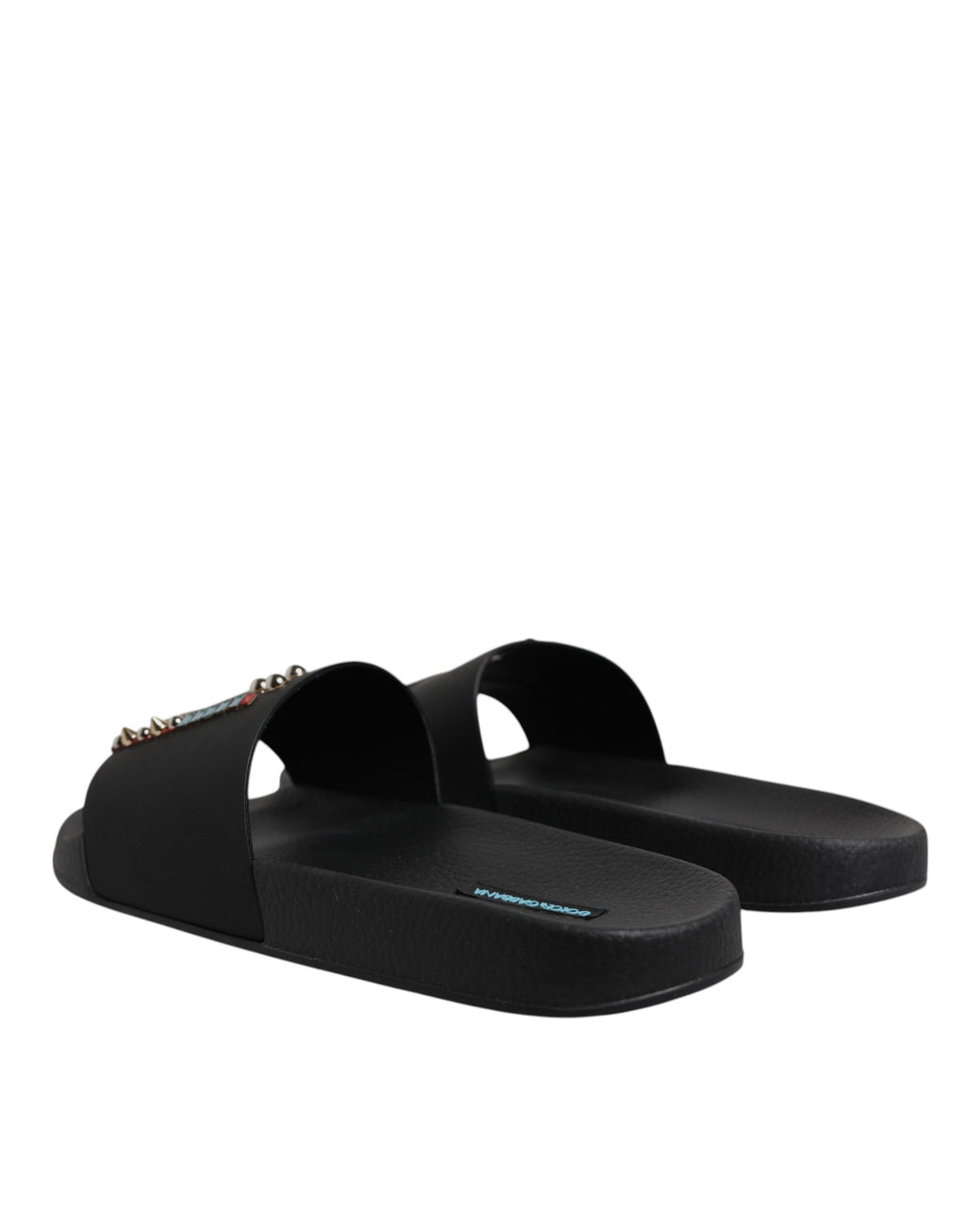 Sandales plates noires Dolce & Gabbana en cuir pour femmes, parfaites pour la plage et le confort estival.
