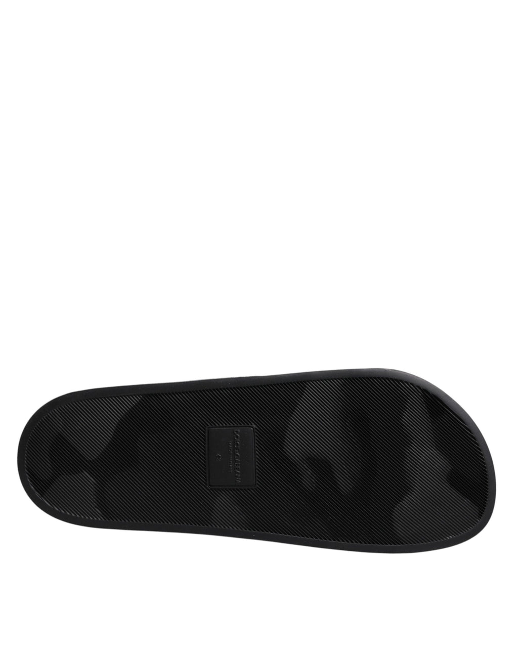 Sandales plates en cuir noir Dolce & Gabbana pour femmes, chaussons de plage confortables et élégants.