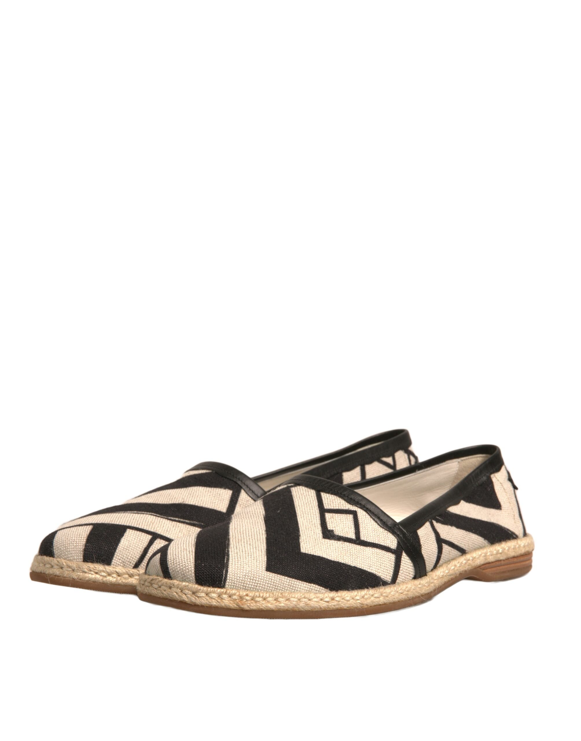 Chaussures espadrilles à enfiler Dolce & Gabbana à rayures noires et blanches, en toile avec semelle en corde naturelle.