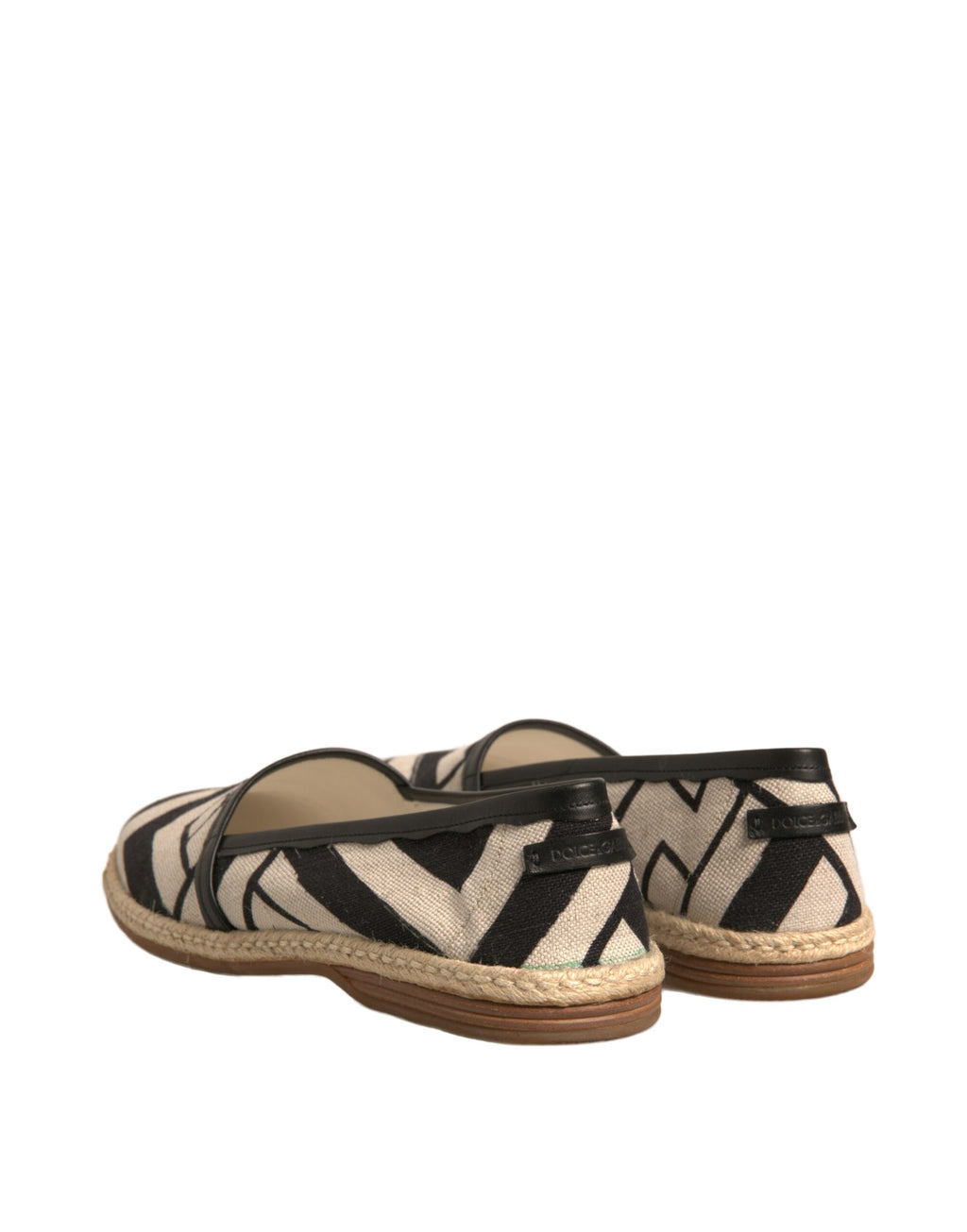 Chaussures Dolce & Gabbana espadrilles à enfiler noires et blanches à rayures, style décontracté et sophistiqué.