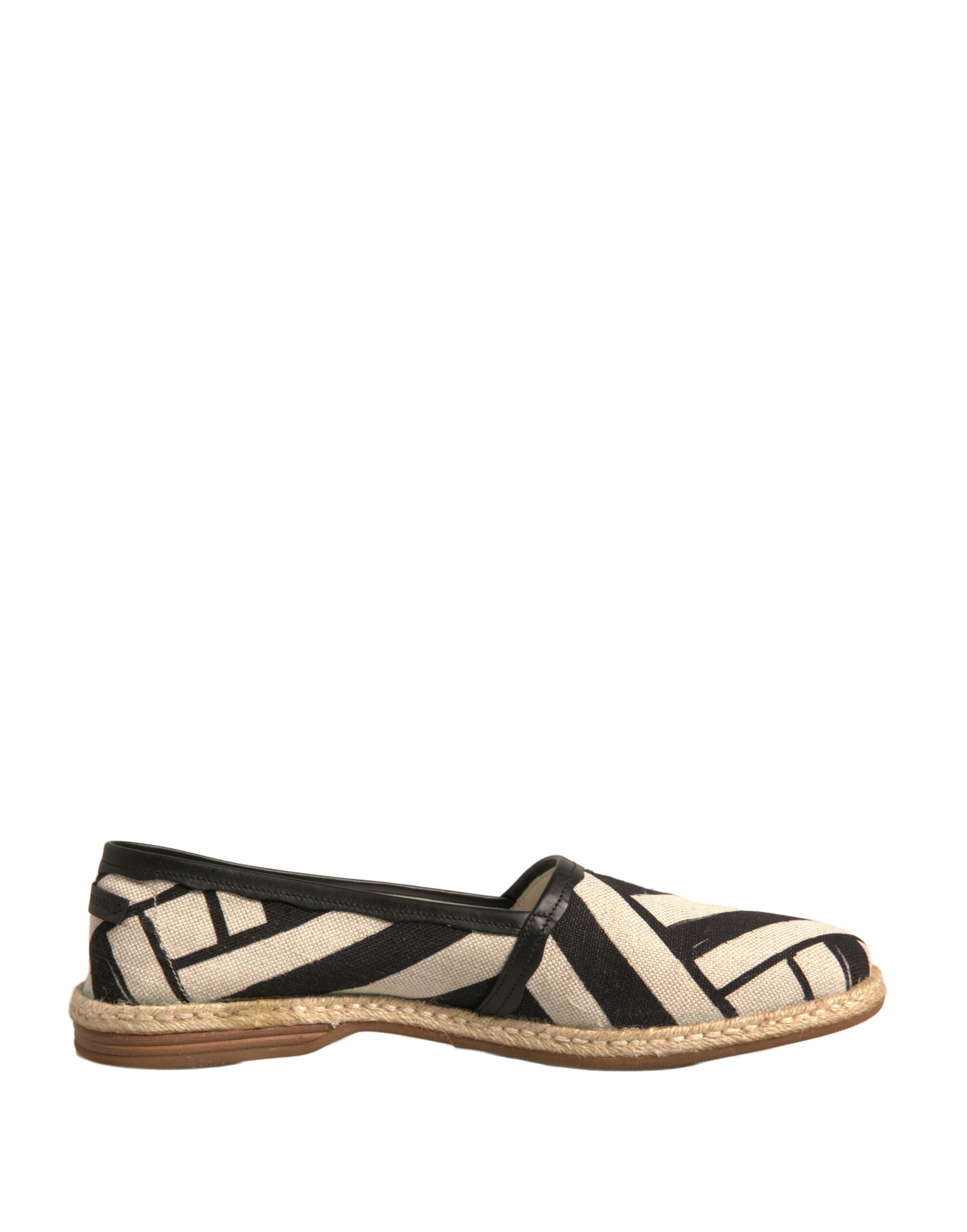 Chaussures espadrilles Dolce & Gabbana à rayures noires et blanches, slip-on, chaussures élégantes pour femmes.