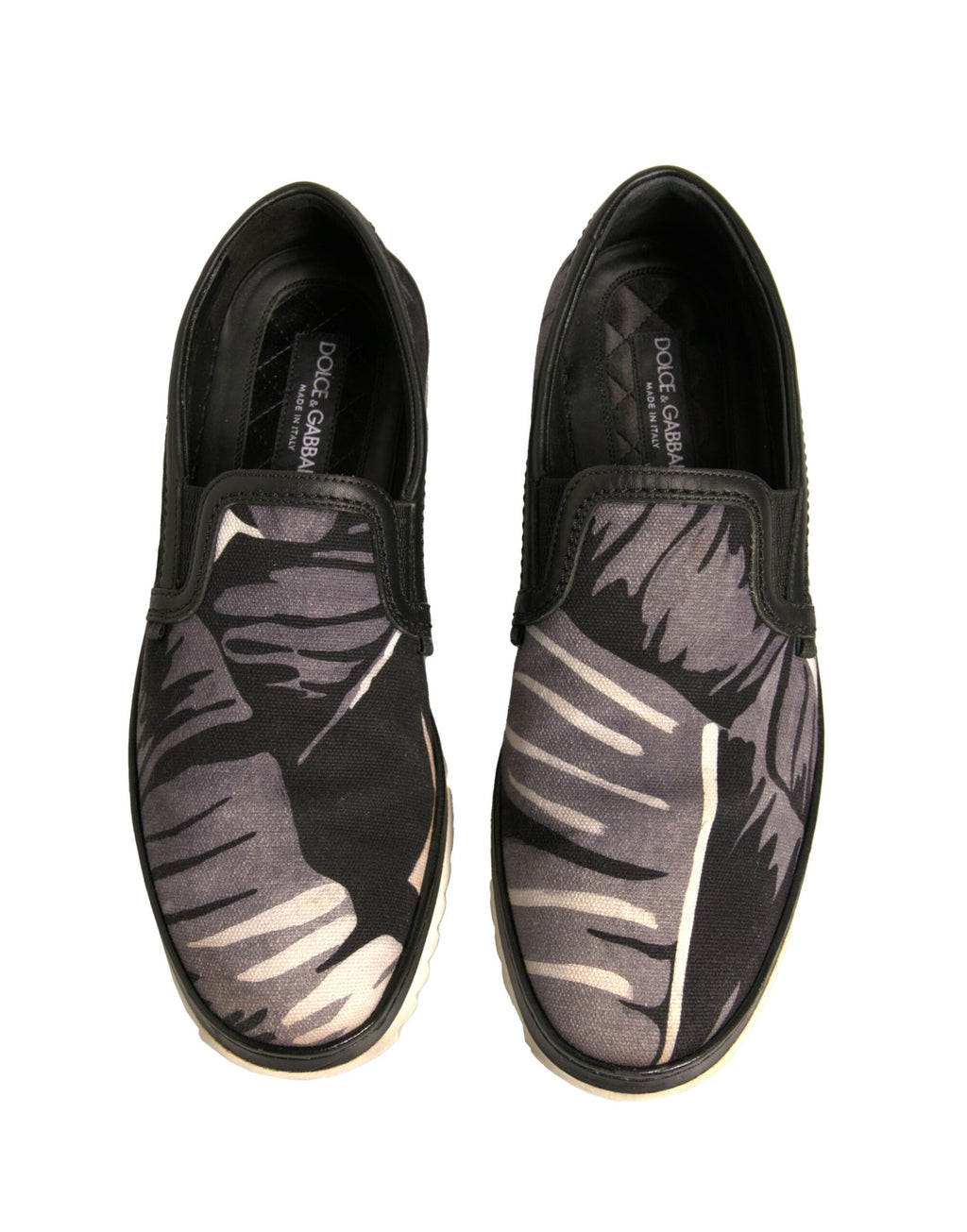 Chaussures Dolce & Gabbana en toile noire avec motif tropical, chaussures slip-on élégantes et confortables.