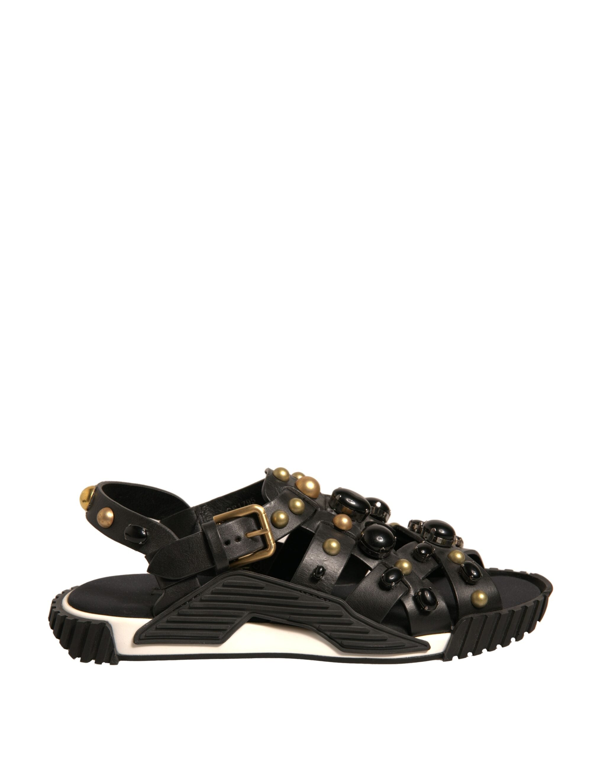 Sandales Dolce & Gabbana en cuir noir avec studs, chaussures élégantes à semelle plate et design sophistiqué.