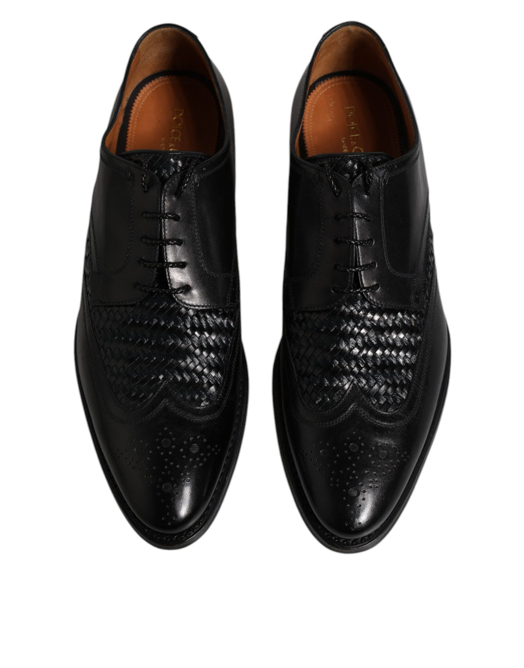 Chaussures Derby noires en cuir Dolce & Gabbana avec détails wingtip et laçage pour chaussures habillées formelles.
