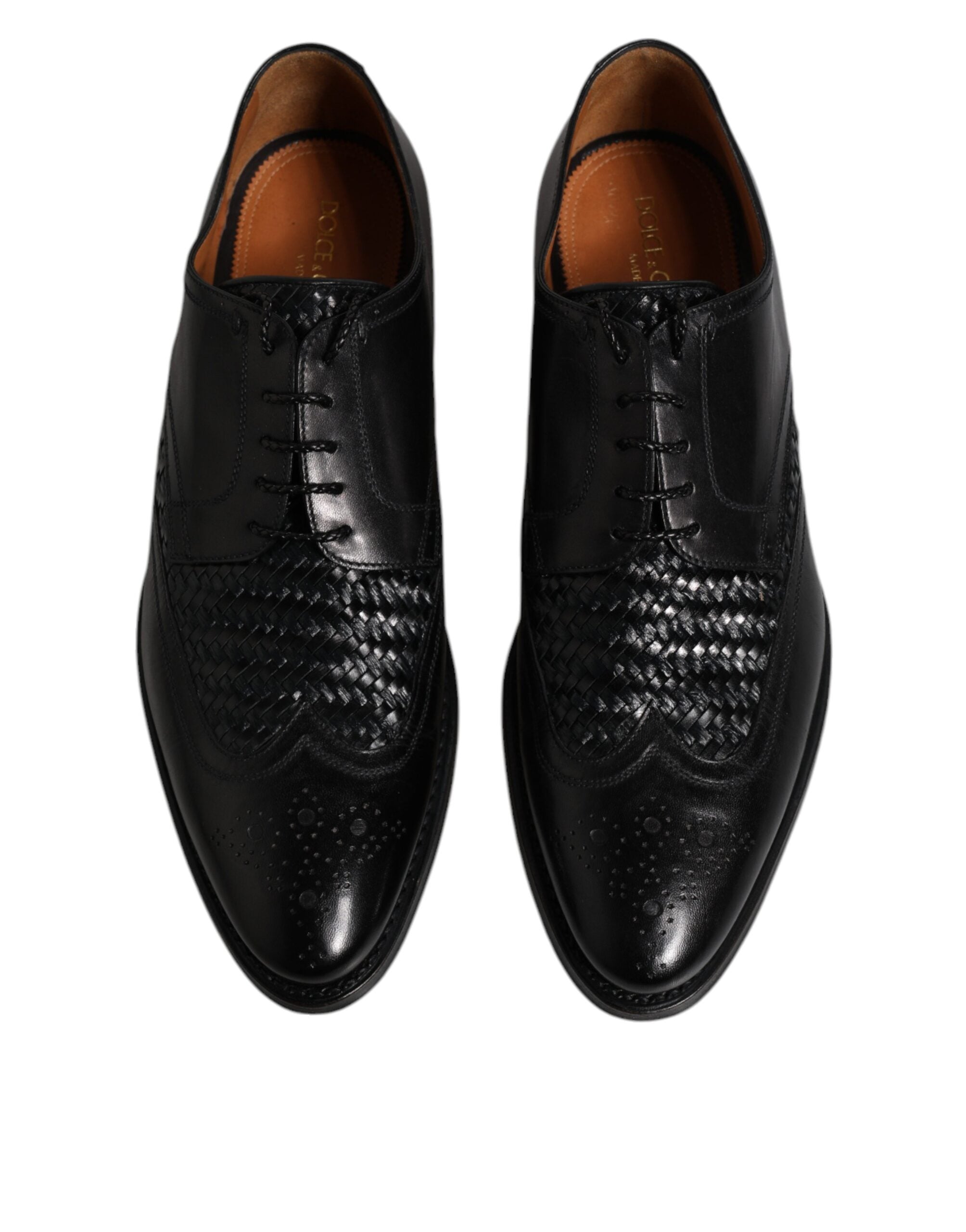 Chaussures Derby noires en cuir Dolce & Gabbana avec détails wingtip et laçage pour chaussures habillées formelles.