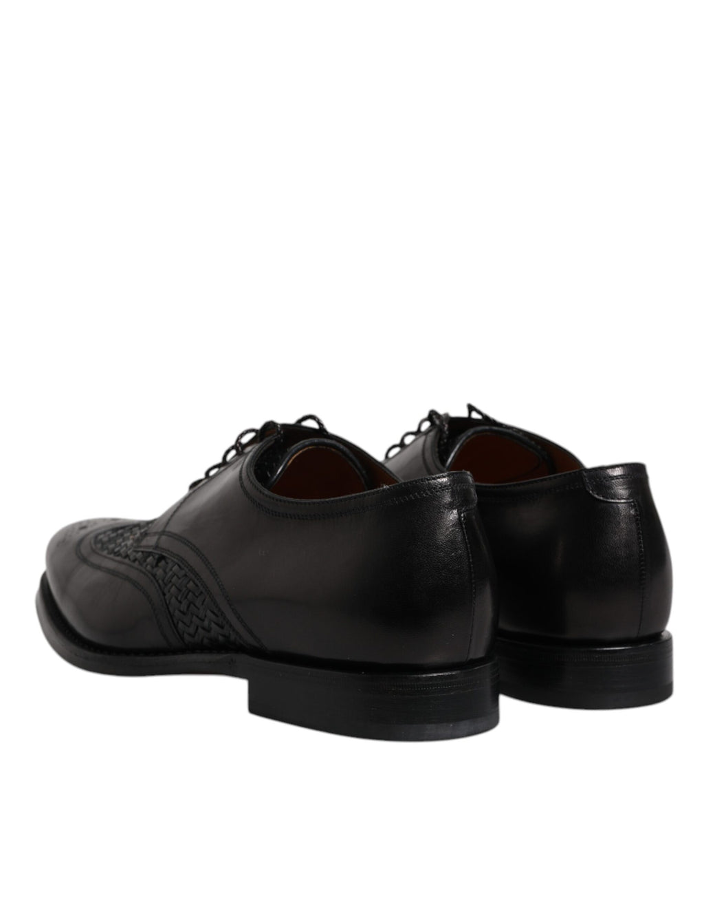 Chaussures habillées Derby Wingtip en cuir noir de Dolce & Gabbana, lacets, style formel et élégant.