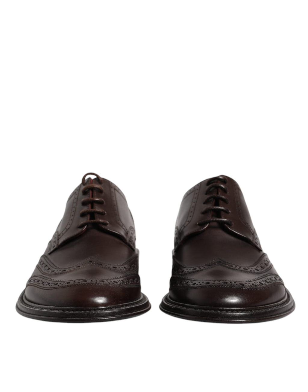 Chaussures de ville Derby wingtip en cuir marron de Dolce & Gabbana, lacets et finition élégante pour tenue formelle.