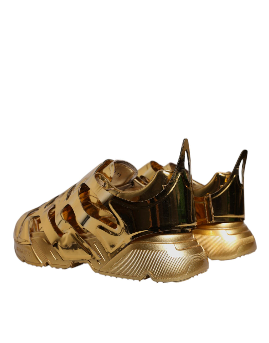 Chaussures Dolce & Gabbana Daymaster en cuir doré, baskets basses élégantes avec semelle blanche et design moderne.