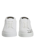 Chaussures sneakers basses en cuir blanc Dolce & Gabbana avec lacets, vue de face.