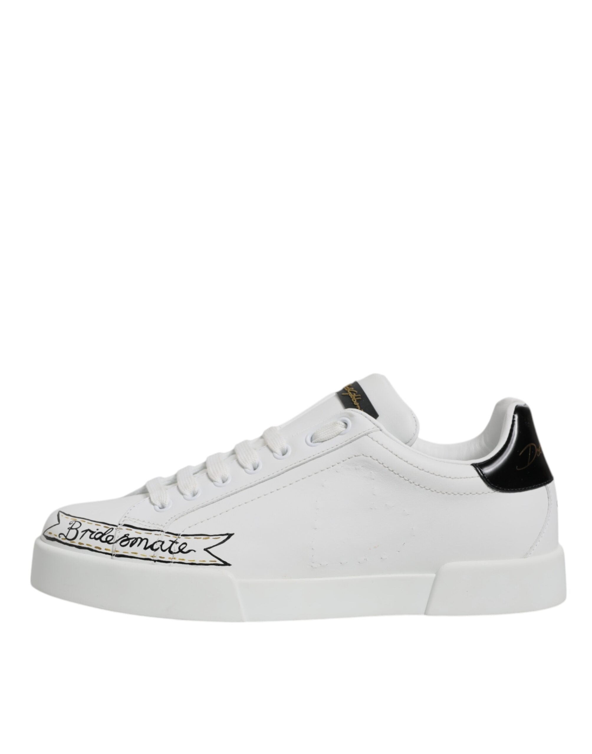 Chaussures sneakers basses en cuir blanc Dolce & Gabbana avec lacets, vue en détail sur le dessus et la semelle.