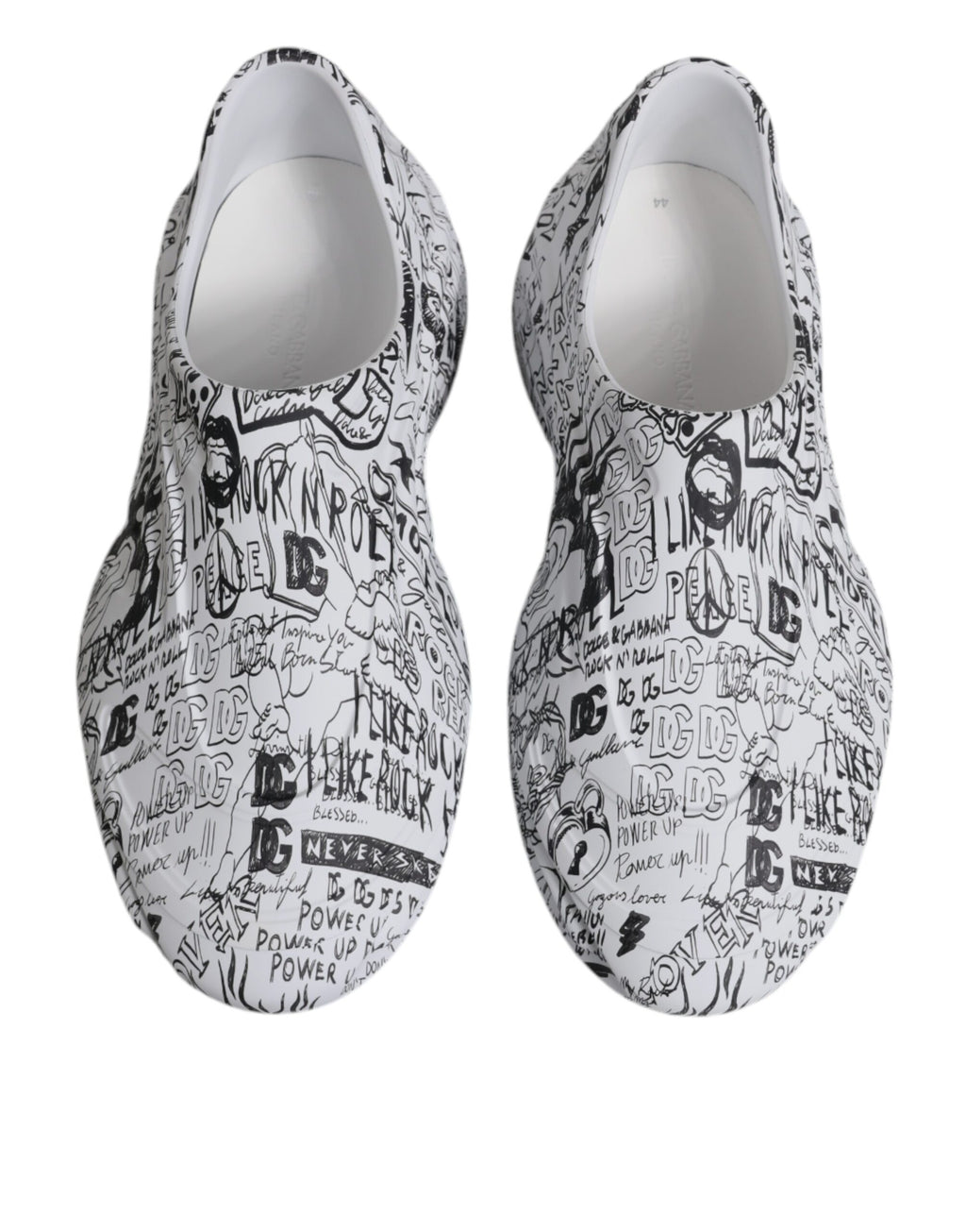 Chaussures sneakers Dolce & Gabbana Daymaster en blanc et noir avec graffiti, style décontracté et moderne.