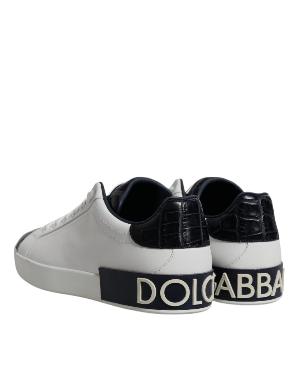 Chaussures sneakers Portofino en cuir blanc et noir de Dolce & Gabbana, vue de face, avec détails de la semelle et des lacets.