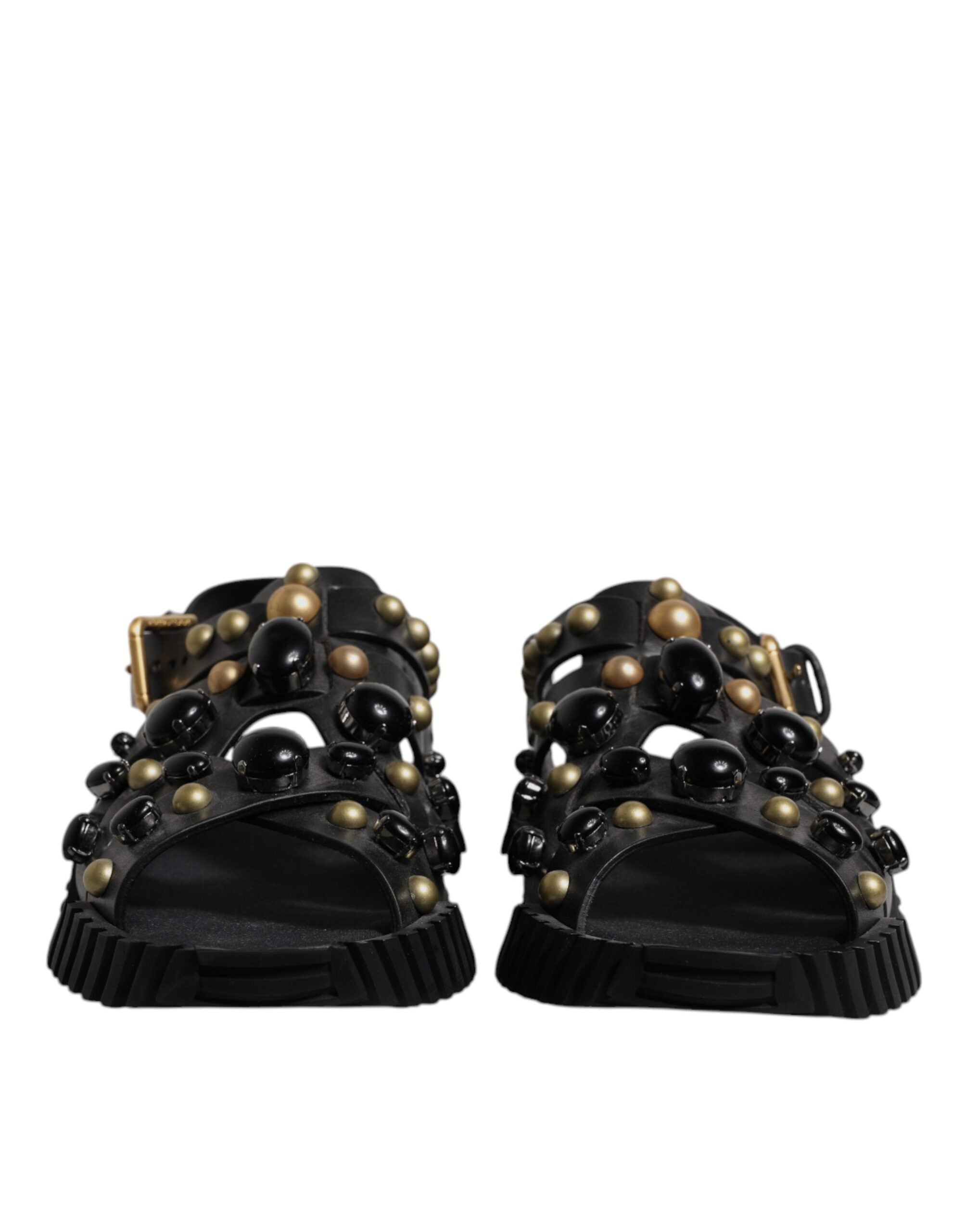 Sandales Dolce & Gabbana en cuir noir avec clous, chaussures à talon bas et style élégant.