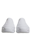 Chaussures sneakers basses blanches Dolce & Gabbana Daymaster pour hommes, vue de face avec design élégant.