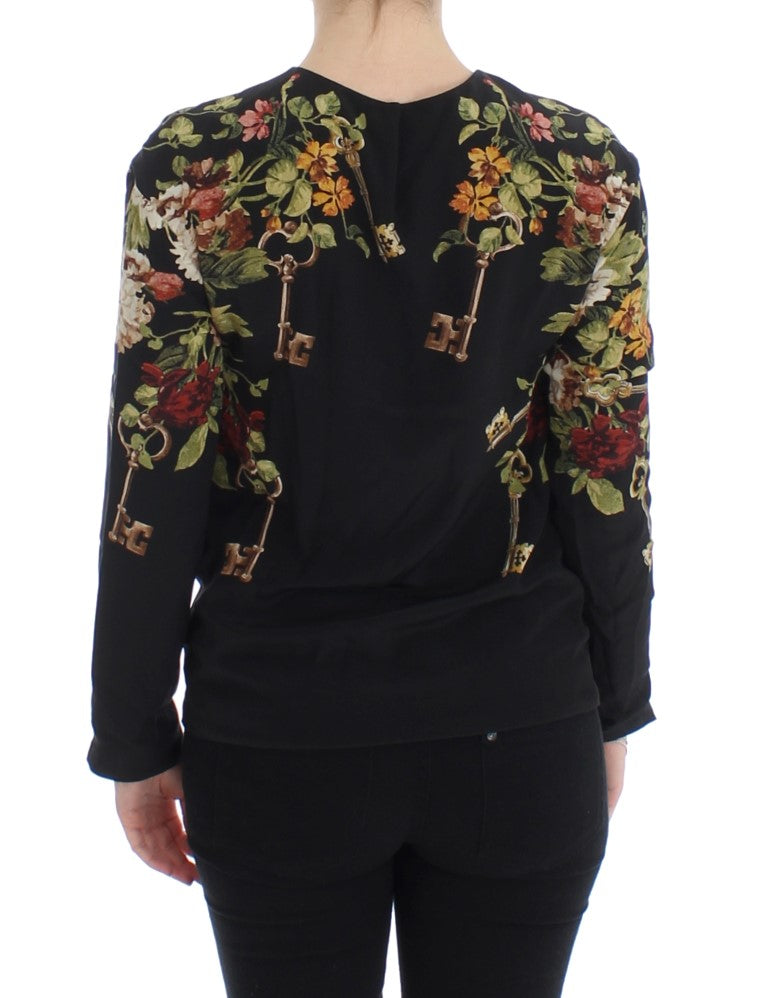 Chemisier en soie noir Dolce & Gabbana avec motif floral clé, élégant et féminin, vue de face.