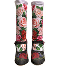 Chaussettes noires à fleurs Dolce & Gabbana avec cristaux, portant des chaussures en jersey élégantes et sophistiquées.