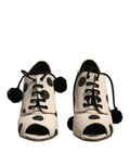 Chaussures à talons ouverts Dolce & Gabbana blanches et noires à pois, bottines à enfiler élégantes avec semelles en cuir.
