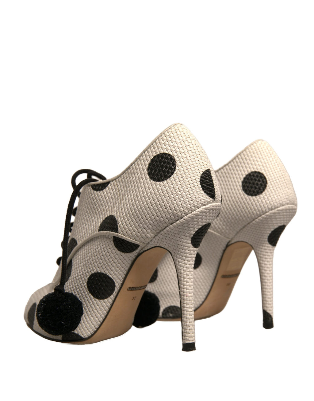 Chaussures Dolce & Gabbana bottines à talons ouverts blanches et noires à pois, style peep toe et ankle.