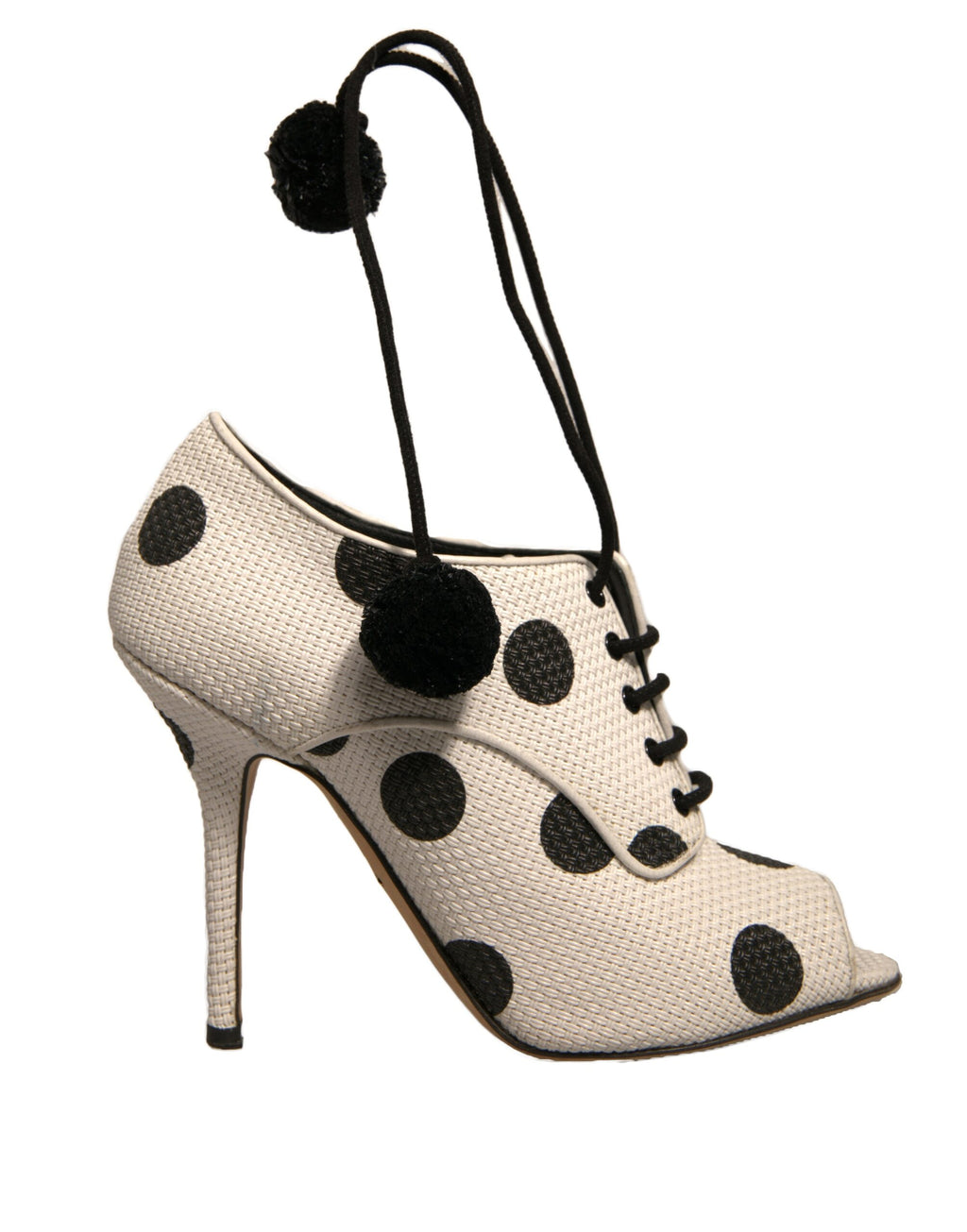 Chaussures à talons ouverts Dolce & Gabbana blanches et noires à pois pour la cheville, style peep toe et élégantes.