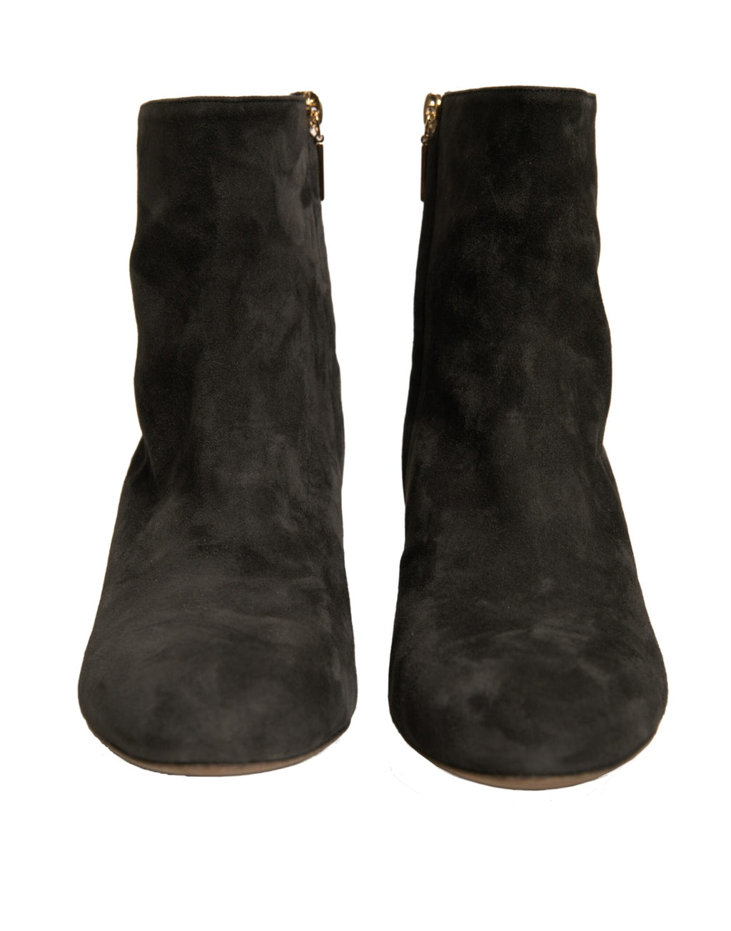 Bottines noires Dolce & Gabbana à talons avec embellissements et détails élégants visibles en gros plan.