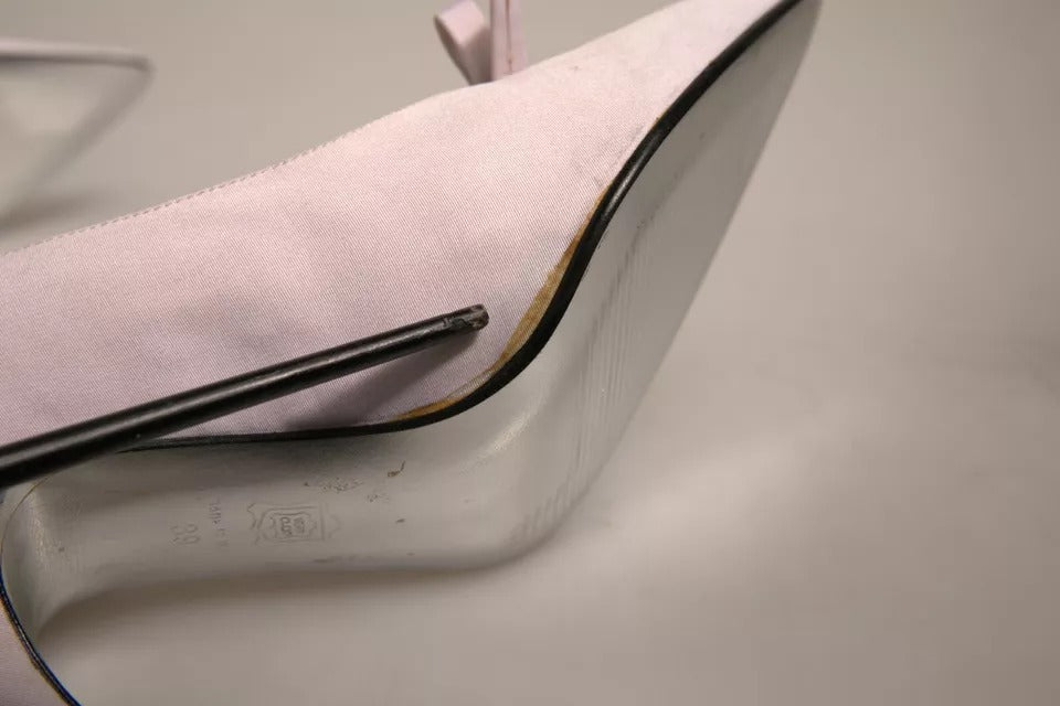 Escarpins pour femmes Dolce & Gabbana en cuir blanc, talons hauts élégants et sophistiqués.