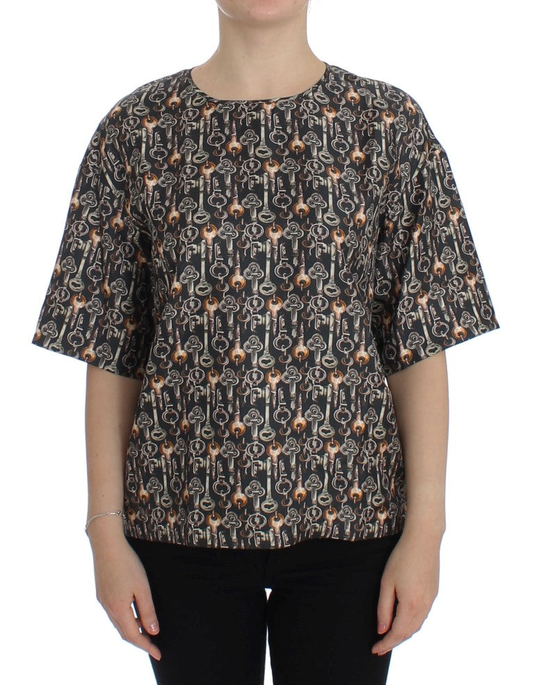 Chemise en soie Dolce & Gabbana gris à motif clé doré, élégante blouse à manches longues et style sophistiqué.