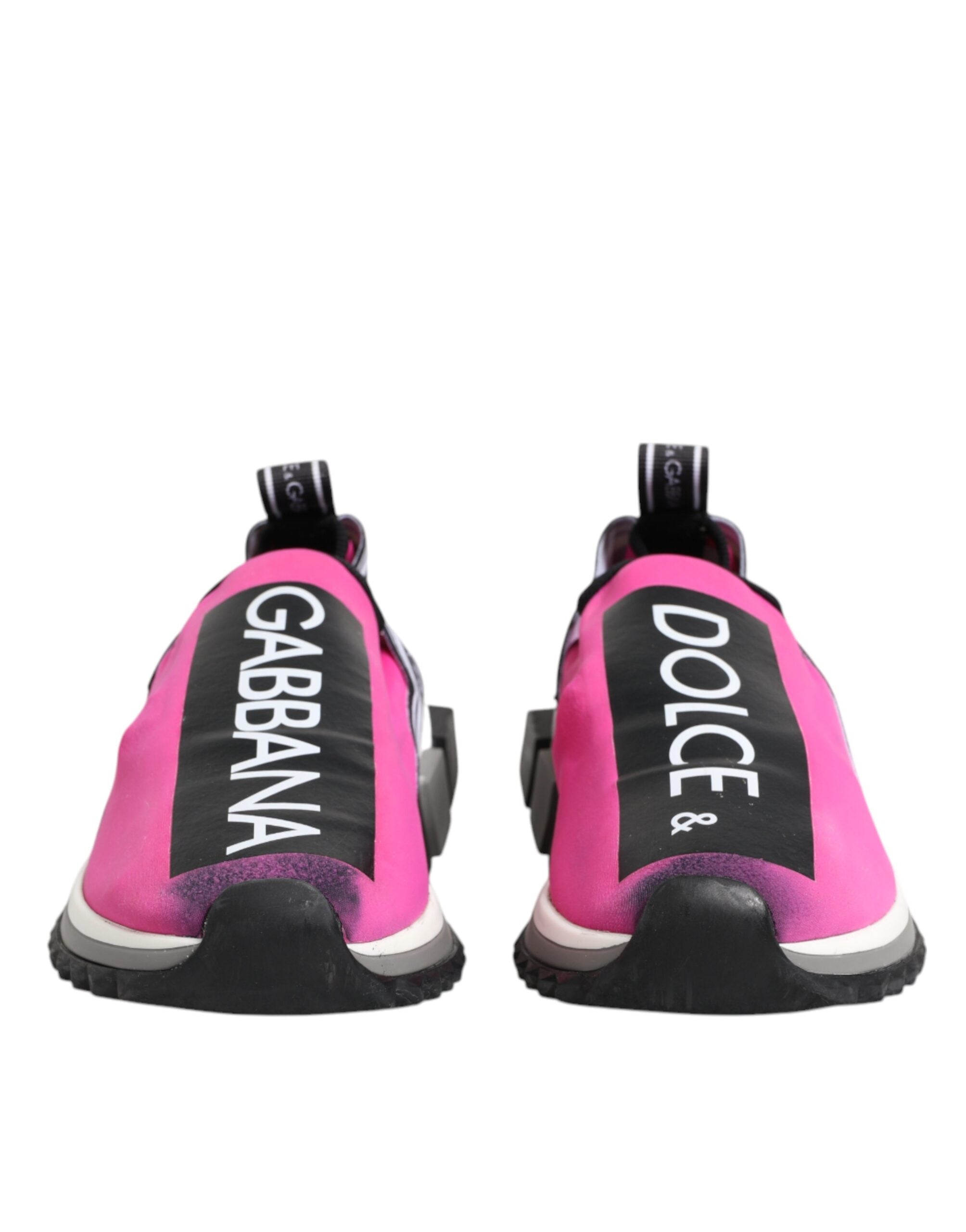 Chaussures sneakers Dolce & Gabbana Sorrento blanches et fuchsia, slip-on, vues de côté, pour femme.