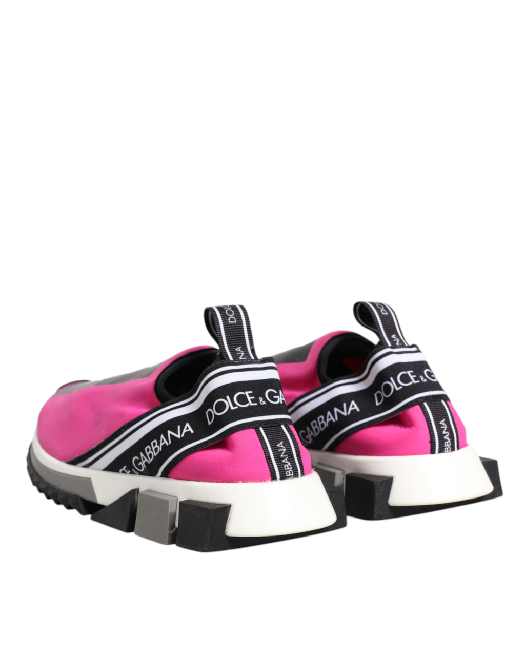 Chaussures sneakers Dolce & Gabbana Sorrento blanches et fuchsia, slip-on, pieds visibles, style décontracté et élégant.