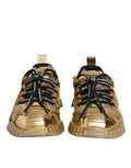 Chaussures sneakers Dolce & Gabbana en dentelle dorée, lacets extensibles et style élégant visible sur l'image.