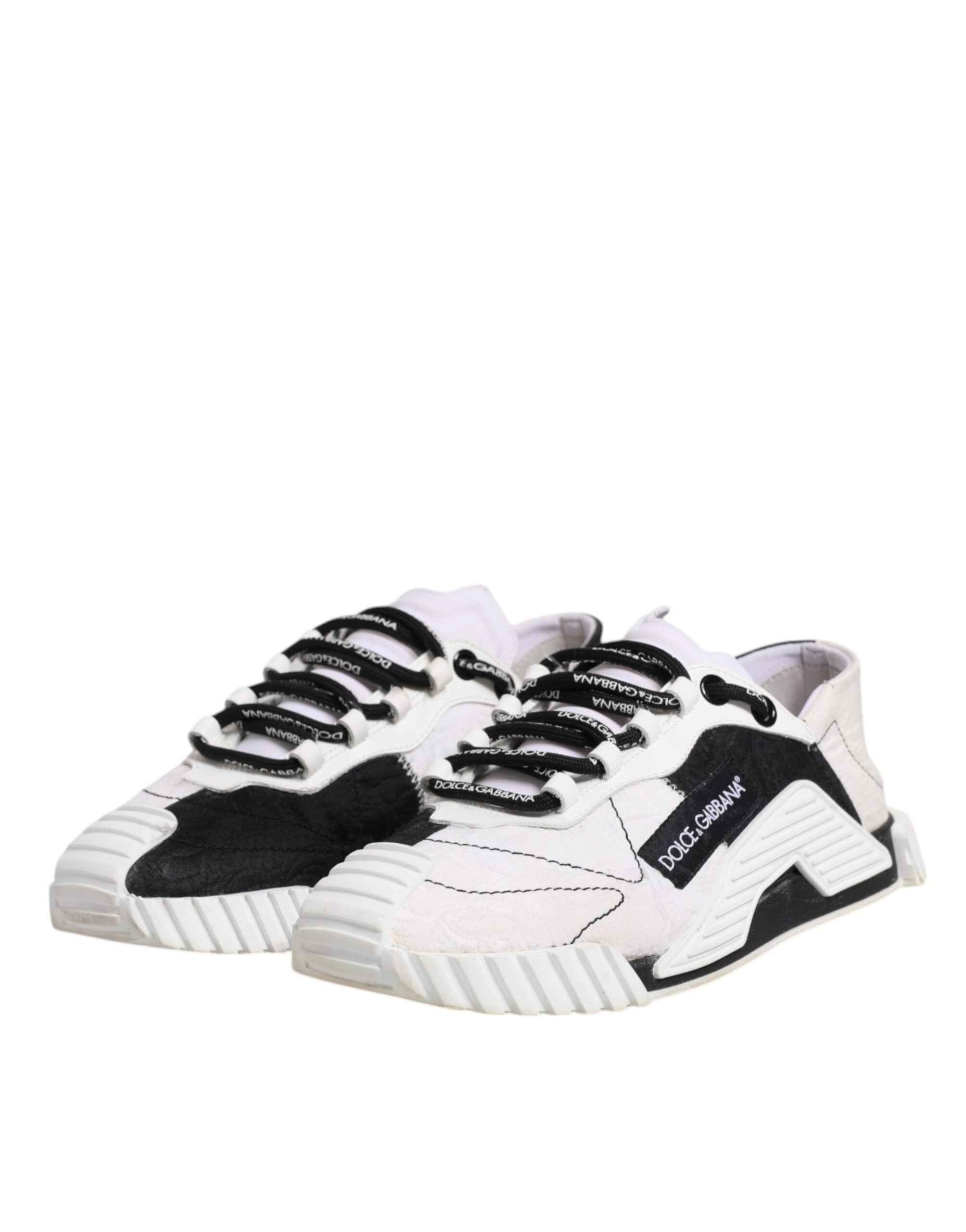 Chaussures basses Dolce & Gabbana NS1 blanches et noires, sneakers élégants en cuir avec détails contrastés.