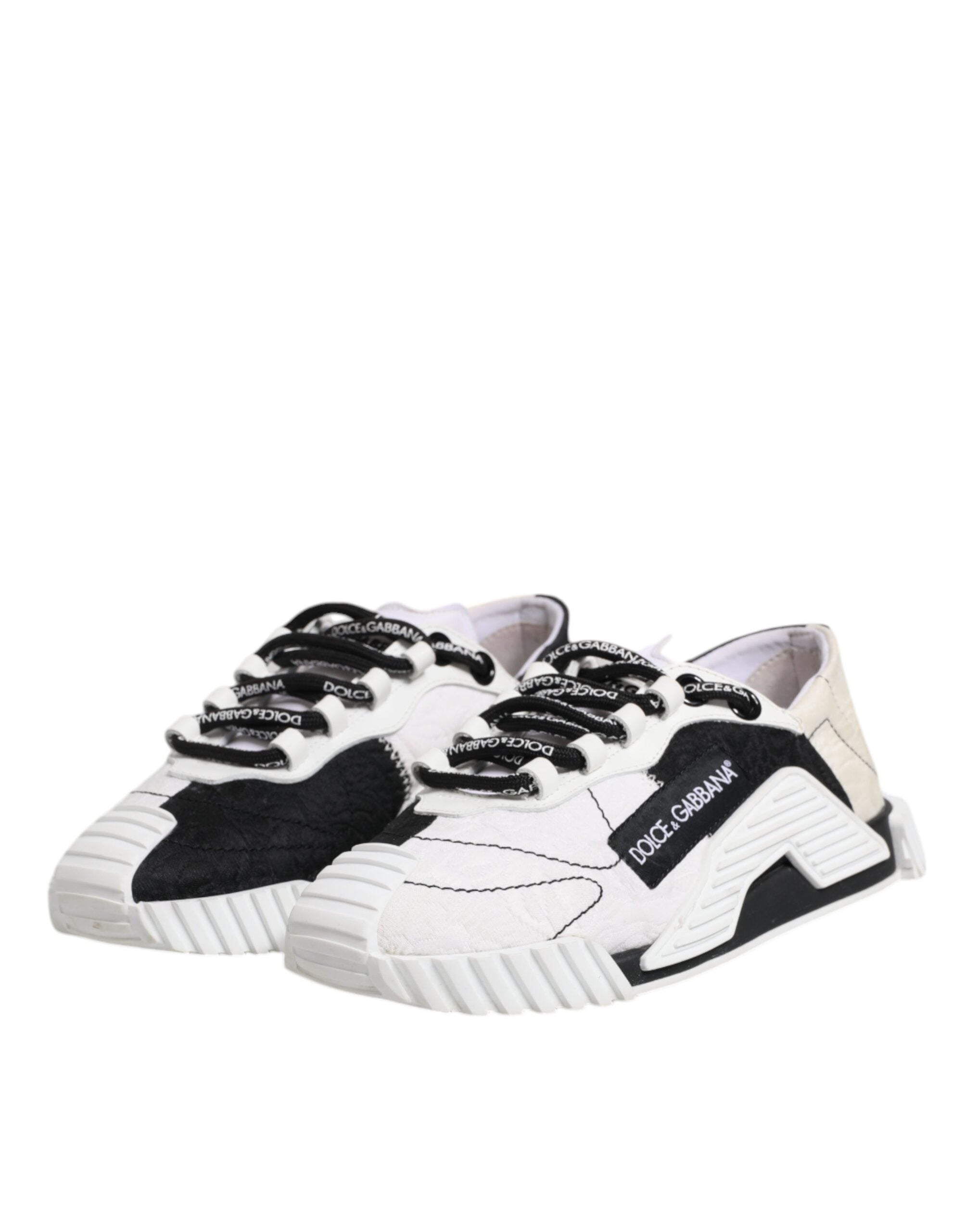 Chaussures sneakers basses Dolce & Gabbana NS1 en blanc et noir, vue de face, en toile avec semelle blanche.