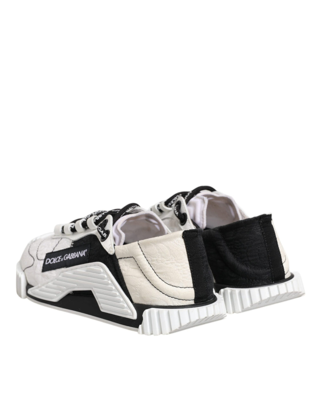 Chaussures sneakers basses Dolce & Gabbana NS1 blanches et noires, tendance, en cuir avec semelle blanche, vue de face.