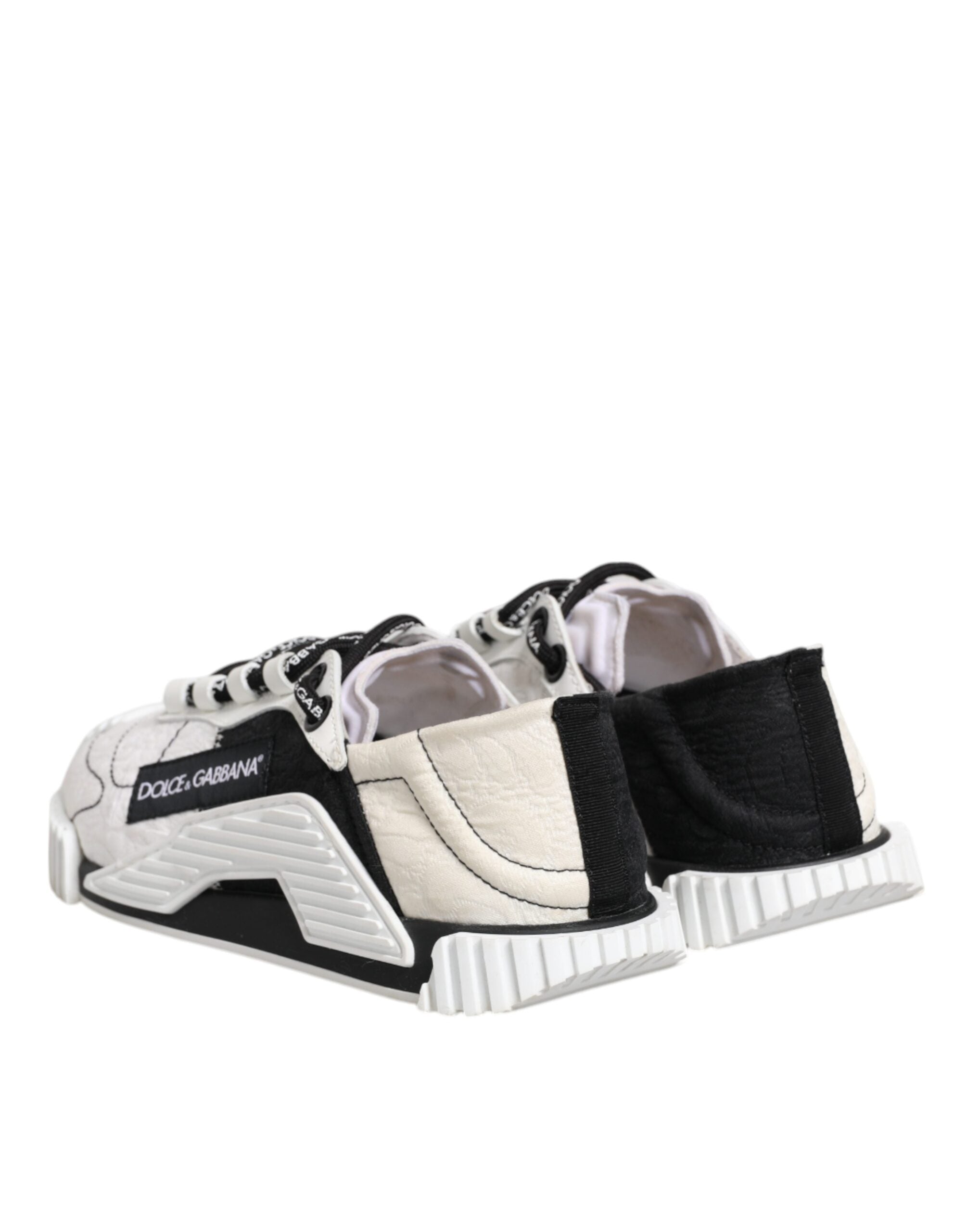 Chaussures sneakers basses Dolce & Gabbana NS1 blanches et noires, tendance, en cuir avec semelle blanche, vue de face.