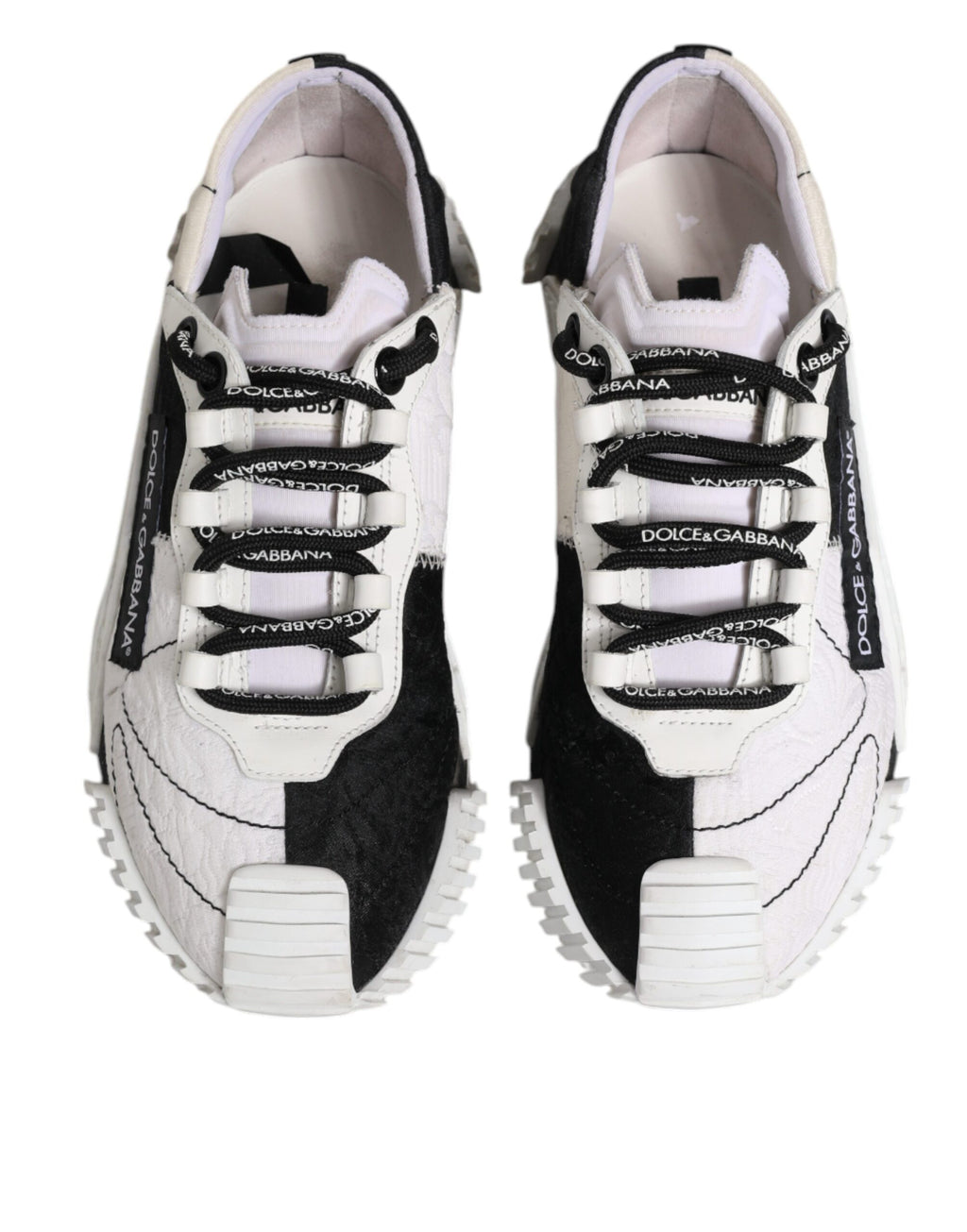 Chaussures sneakers basses Dolce & Gabbana NS1 en blanc et noir, vue de face, avec détails de design modernes.