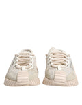 Chaussures de sport blanches Dolce & Gabbana NS1 en dentelle, baskets basses élégantes et confortables pour un style moderne.