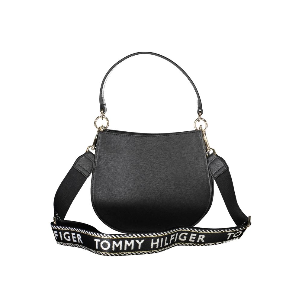 Sac à main Tommy Hilfiger en polyester noir, avec poignées élégantes et détails de marque visibles.