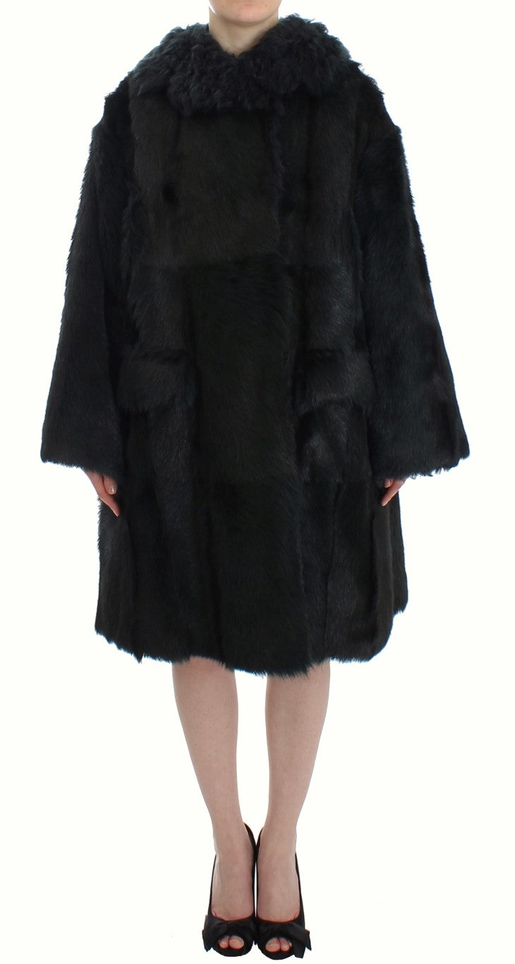 Manteau long en shearling en fourrure de chèvre noire de Dolce & Gabbana, avec col et détails élégants.