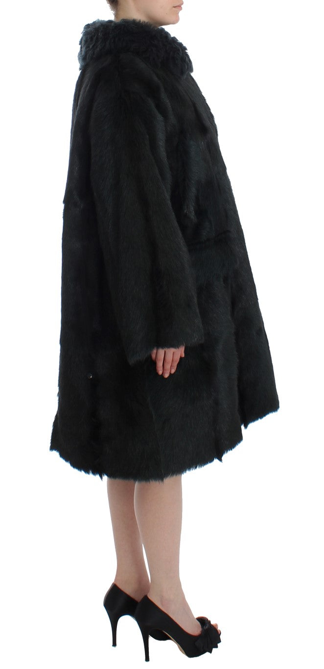 Manteau long en shearling de chèvre noir de Dolce & Gabbana, avec doublure en fourrure de chèvre et style élégant.