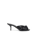 Sandales plateformes en serpent noir de Dolce & Gabbana, style élégant et sophistiqué, en cuir brillant et détails raffinés.