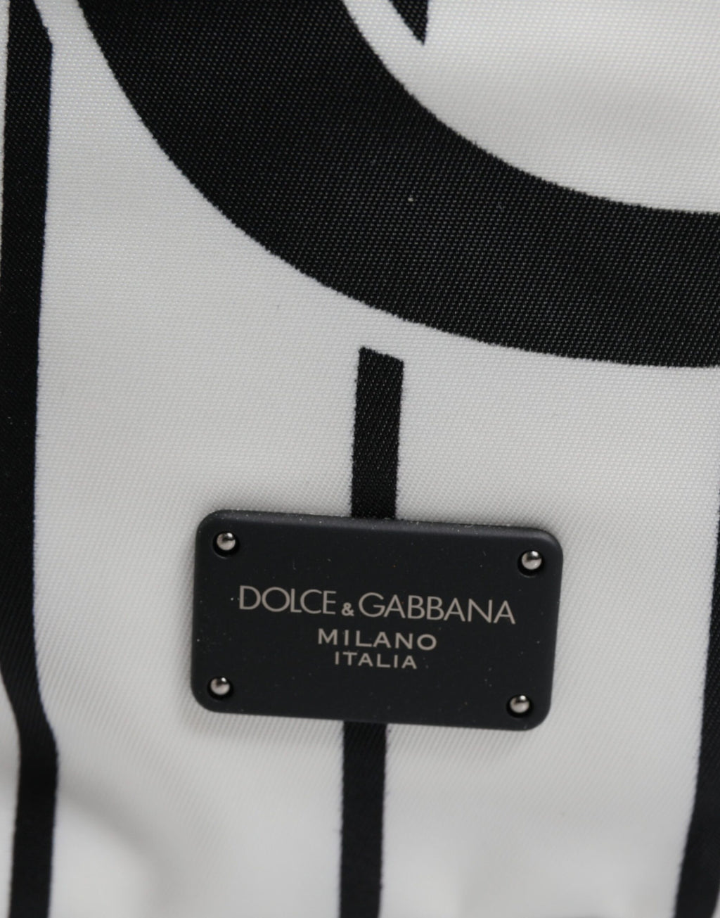 Sac à dos pour homme Dolce & Gabbana Vulcano Royal King en noir et blanc avec motif imprimé, style élégant et moderne.